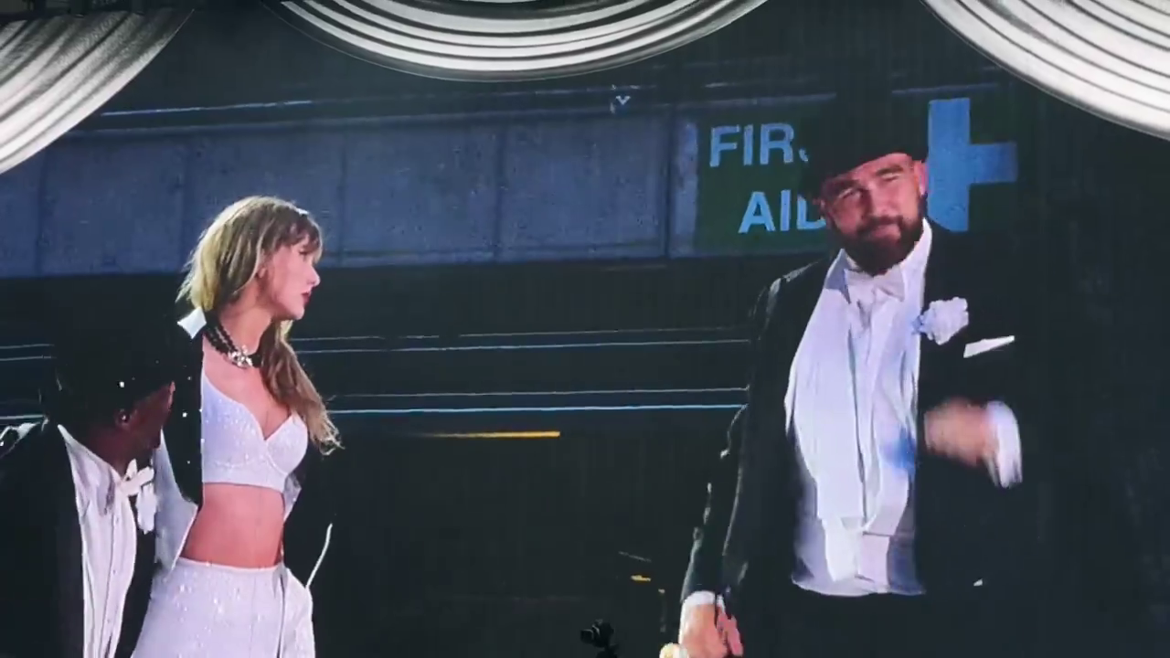 Travis Kelce and Taylor Swift on Stage at Eras Tour