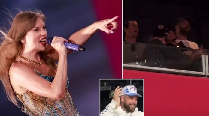 Taylor Swift pointing to Travis Kelce