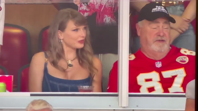 Travis Kelce’s dad, Ed is sitting alongside Taylor Swift for tonight’s season opener game.