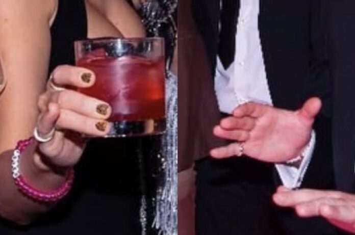 Travis Kelce and Taylor Swift with pinky rings