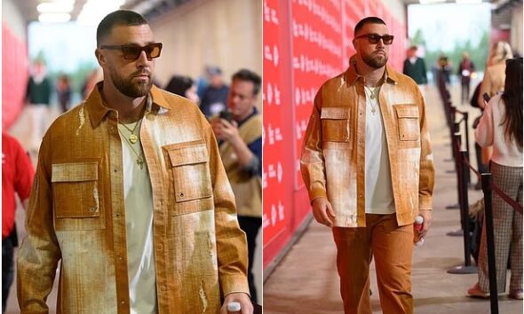 Just days after his breakup with Taylor Swift, Travis Kelce wears a striking orange outfit as he arrives for the Chiefs vs. Commanders — looking depressed and exhausted.