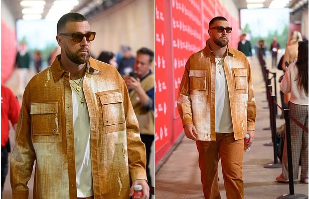Just days after his breakup with Taylor Swift, Travis Kelce wears a striking orange outfit as he arrives for the Chiefs vs. Commanders — looking depressed and exhausted.