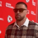 Fans criticize Travis Kelce’s outfit at the Chiefs vs. Lions game — say he looks like a cab driver with poor fashion sense and blame Taylor Swift!